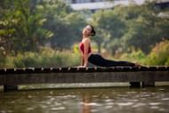 Backbends are known for strengthening the back. (Image via Pexels/Shu Lei)